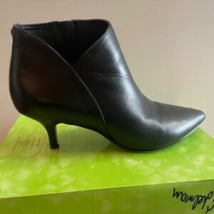 Ankle length leather black booties.